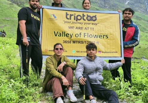 Nature lovers hiking through the Valley of Flowers National Park in the Garhwal Himalayas